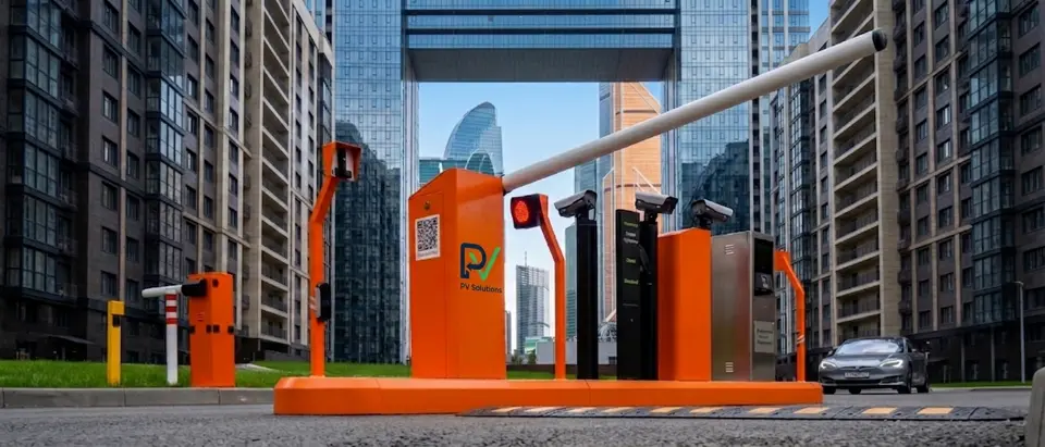 Parking barrier with ANPR cameras recognising a car's license plate